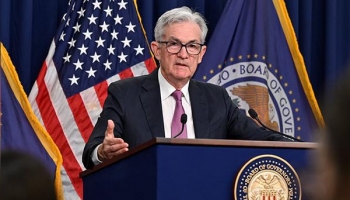 Fed raises rate