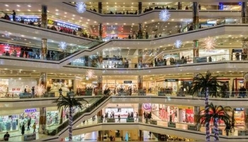 shopping mall; shopping center; department store; emporium; CL:家[jiā]; the business world